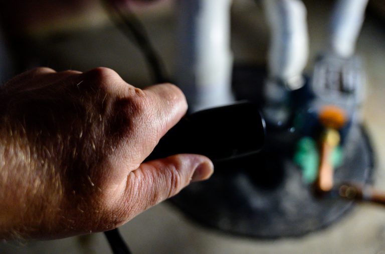 Power,Outage,With,Flash,Light,Shining,On,Sump,Pump